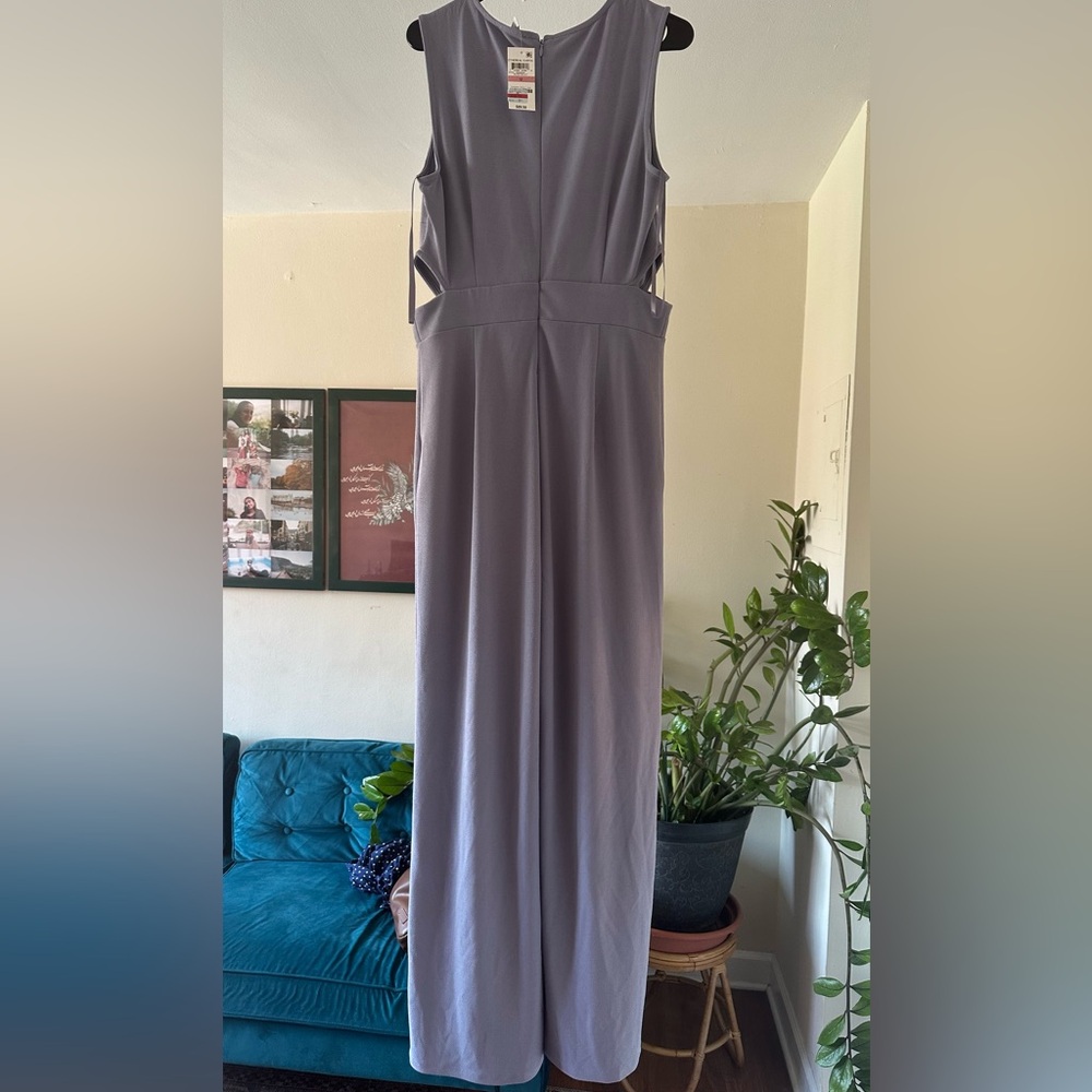 Bar III light purple and wide leg sleeves jumpsuit with waist cut out.